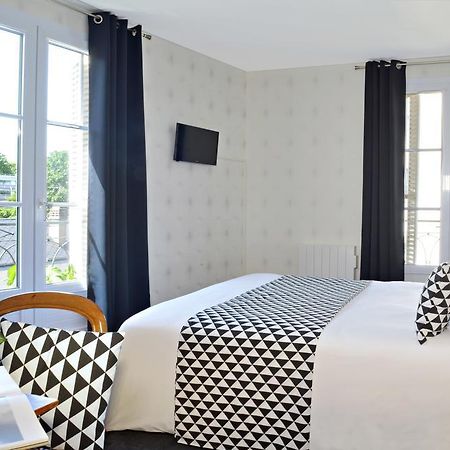 Hotel Du Manoir Tours Bagian luar foto